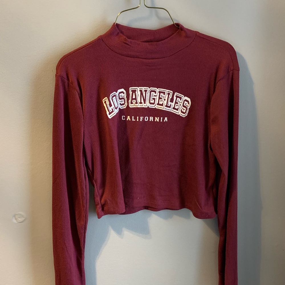 Burgundy “Los Angeles” mock turtle neck long sleeve tee.